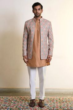 Mint bandhgala with al over mandala, floral print and accentuated with vivid threads embroidery. Paired with an inner tan kurta with placement pintuck work and pant. - Aza Fashions Fitted Sherwani With Printed Motifs For Eid, Fitted Sherwani With Traditional Patterns, Fitted Bandhgala With Traditional Patterns, Wedding Bandhgala With Printed Motifs For Diwali, Wedding Bandhgala With Printed Motifs, Transitional Season Multicolor Fitted Bandhgala, Fitted Sherwani With Traditional Patterns For Eid, Bollywood Style Fitted Sherwani With Printed Motifs, Fitted Bandhgala With Printed Motifs For Diwali