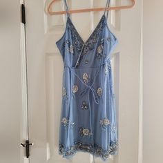 Nwt Blue Beaded Wrap Mini Dress. Size Small But Fits Like An Xs. Blue Embellished V-neck Mini Dress, Light Blue Embellished Summer Dress, Spring Beaded Mini Dress, Beaded Mini Length Summer Dress, Spring Beaded V-neck Dress, Spring Embellished Mini Dress For Vacation, Embellished Mini Dress For Vacation And Spring, Spring Vacation Embellished Mini Dress, Spring Beach Beaded Dress