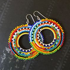 Hoop Dangle Earrings Hoop Earrings Boho Earrings Tribal Ethnic - Etsy Bohemian Multicolor Hoop Jewelry, Multicolor Bohemian Hoop Jewelry, Bohemian Multicolor Hoop Earrings, Colorful Bohemian Hoop Jewelry, Multicolor Hoop Earrings With Ear Wire, Multicolor Beaded Hoop Jewelry, Multicolor Circular Hoop Earrings For Festivals, Colorful Bohemian Hoop Earrings, Colorful Bohemian Hoop Earrings For Festival