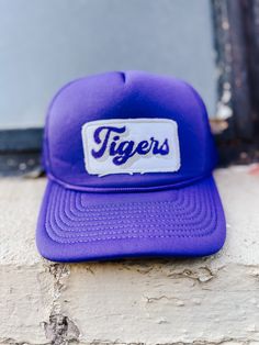 Purple Trucker Snapback Hat, adjustable Adjustable Flat Bill Hats For College, College Snapback Hat One Size Fits Most, Trendy Purple Adjustable Baseball Cap, College Snapback Cap, Trendy Adjustable Purple Baseball Cap, College Snapback Hat, Casual Game Day Trucker Hat, Casual Adjustable Trucker Hat For Game Day, Adjustable Cap With Letter Patch