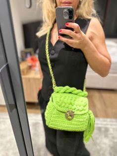 This handmade knitted green bag has a spacious interior and is a very cool piece. You can easily use this bag everywhere in your daily life. Green Cotton Crochet Bag For Everyday Use, Trendy Green Knitted Shoulder Bag, Green Hand Knitted Shoulder Bag For Daily Use, Trendy Green Crochet Bag With Braided Handles, Green Casual Crochet Bag Hand Knitted, Casual Green Hand Knitted Crochet Bag, Daily Use Green Hand Knitted Shoulder Bag, Green Knitted Everyday Bags, Green Rectangular Cotton Crochet Bag