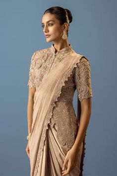 Beige pre-draped saree with floral, cutwork embroidered border. Paired with a blouse with an extended panel and floral bloom, pearl, cutdana, sequin embroidery. - Aza Fashions Reception Blouse With Cutdana And Traditional Drape, Traditional Drape Blouse With Cutdana For Reception, Bollywood-style Draped Wedding Blouse Piece, Draped Blouse With Zari Work For Wedding, Traditional Blouse With Draped Sleeves, Wedding Blouse With Resham Embroidery And Draped Shape, Wedding Blouse With Draped Resham Embroidery, Silk Blouse Piece With Draped Sleeves For Wedding, Draped Wedding Blouse With Zari Work