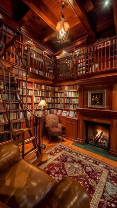 a living room filled with furniture and a fire place in front of a book shelf