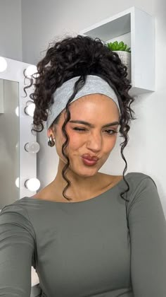 Cute Updos For Work Nurse, Braid With Headband Hairstyles, Head Bands For Curly Hair, Hairband Hairstyle Curly Hair, Headband In Curly Hair, Curly Hair Updo With Headband, Headband And Curly Hair, Curly Bun With Headband, Curly Updo With Headband