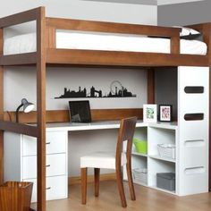 a loft bed with desk underneath it