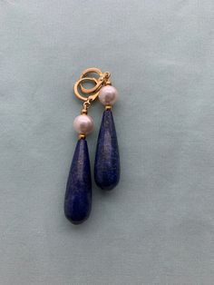 "LAPIS LAZULI Long Teardrops, Regency Reproduction, 16k gold or silver plated brass, reproduction historic, blue LAPIS historic earrings These natural and stunning flecked LAPIS LAZULI real natural stone Teardrop earrings were inspired by extant examples of the era, and work beautifully for multiple historic eras, Georgian, Regency and Victorian! This listing is for a pair of reproduction historic real lapis lazuli Teardrop stones in a lovely dark royal blue with hints of midnight and gold speck Elegant Blue 14k Gold Hoop Earrings, Blue Teardrop Gemstone Hoop Earrings, Classic Drop Shape Clip-on Jewelry, Classic Clip-on Drop Jewelry, Luxury Blue Teardrop Earrings, Blue Teardrop Pearl Drop Jewelry, Vintage Single Teardrop Earring, Elegant Gold Lapis Lazuli Earrings, Classic Blue Teardrop Jewelry