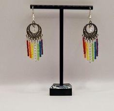 Vertical rainbow earrings Rainbow Dangle Metal Earrings, Rainbow Metal Earrings With Ear Wire, Rainbow Metal Drop Earrings, Rainbow Metal Earrings, Multicolor Metal Earrings With Ear Wire, Adjustable Round Rainbow Earrings, Multicolor Metal Ear Wire Earrings, Rainbow Drop Earrings For Pierced Ears, Multicolor Dangle Plug Earrings For Pierced Ears