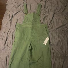 New With Tag Size Large Very Pretty Green Flare Paid $100 Original For It And Never Wore It Smoke Free Home No Stains Or Rips Green Relaxed Fit Overalls For Spring, Green Cotton Jumpsuits And Rompers For Work, Green Overalls For Work, Fitted Green Overalls For Spring, Casual Green Overalls, Green Wide Leg Jumpsuits And Rompers With Pockets, Spring Green Relaxed Fit Overalls, Green Utility Jumpsuits And Rompers For Spring, Fitted Green Overalls For Workwear