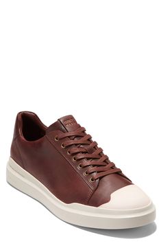 GrandOS energy-foam cushioning and a lightweight profile bring ease to a low-top sneaker built from smooth leather for smarter styling. Leather upper/textile lining/rubber sole Imported Sneaker Men, Foam Cushions, Cole Haan, Mens Shoes Sneakers, Smooth Leather, Low Top, Top Sneakers, Rubber Sole, Leather Upper