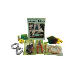 an assortment of crafting supplies including scissors, pliers and tape