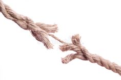 two pieces of rope tied to each other on a white background stock images and clippings