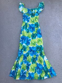 "A beautiful floral dress hailing from Honolulu, Hawaii. Estimate Size: XS Brand: Hawaiian Casuals by Stan Hicks Length: 55\" Bust: 32\" Waist: 25\" Hip: 33\"" Vacation Vintage Fitted Dress, Vintage Fitted Dress For Vacation, Blue Mermaid Dress, Dress Hawaiian Style, Hawaiian Clothes, Hawaiian Wear, Tahitian Dance, Island Style Clothing, Hawaiian Print Dress