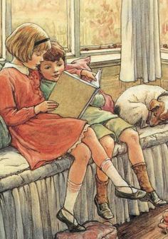 two children are sitting on a couch with a dog and an open book in front of them