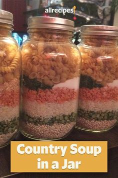 three jars filled with different types of food