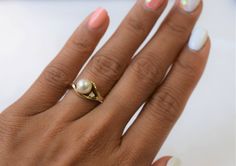 This is a Japanese Akoya pearl ring with a small diamond and is set in 14K yellow gold. The size of the pearl is approximately 7mm. It is silver white in color with high luster. This ring is a size 6.5 Once resized, it is NON-refundable and NON-exchangeable, it is considered FINAL SALE. So, make sure you know your correct ring size. Please read my shop policies for more details! We will ship out the goods once we have received payment. For more information, Like us on Facebook, follow us on Inst Anniversary Yellow Gold Pearl Ring With Diamond, Anniversary Yellow Gold Pearl Ring With Charm, Gold Pearl Ring With Single Diamond For Wedding, Gold Pearl Ring With Single Diamond For Promise, Classic Gold Pearl Ring With Diamond, Gold Akoya Pearl Ring For Wedding, Gold Pearl Ring With Single Diamond As Gift, Akoya Pearl Ring, Baby Pearls