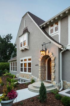 a large house with landscaping around it