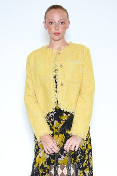 Take risks and stand out in this bold, cropped wool blazer made from premium tweed. Its vibrant yellow color will keep you noticed while its sophisticated wool material exudes elegance. Perfect for adding a bold touch to any outfit. Crafted in a soft pale yellow tweed, this jacket features frayed edges, and beautiful gold buttons adding a stylish and modern twist to the classic cropped design. Composition: 100% Wool Mid-weight fabric Designed for a regular fit, fits true to size Made in New York Design Composition, Yellow Style, American Fashion Designers, Cropped Blazer, Take Risks, Tonga, Tweed Blazer, Yellow Fashion, Pale Yellow