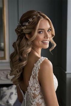 a woman wearing a wedding dress with long hair and a tiara on her head