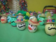 some eggs with hats and mustaches on them