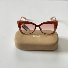 New With Tag Chloe Cat Eye 63mm Sunglasses Peach Red Color Comes With Case And Cleaning Cloth Frame Material: Injected Frame Color: Peach Lens Color: Peach Gradient Nose Pads 100% Uv Protection Made In Italy Over Sized Size: 63 Eye 09 Bridge 140mm Temple For More Styles, Colors And Brands, Please Feel Free To Check Out My Other Listings. P9-21 10-21 D-2 Elegant Pink Cat Eye Sunglasses For Spring, Chic Red Cat Eye Sunglasses With Gradient Lenses, Chic Orange Cat Eye Sunglasses With Gradient Lenses, Chic Orange Sunglasses With Glass Lenses, Chic Orange Glass Sunglasses, Chic Orange Cat Eye Sunglasses, Cloth Frame, Red Sunglasses, Over Sized