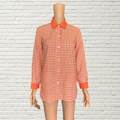 Vintage 60s Orange & White Gingham Blouse  1960s cotton blouse with light orange and white gingham plaid print  collared neckline  pockets  flaws as pictured  Measurements: Length: 27.5" Pit to pit: 18" Shoulder to shoulder: 15" Retro Gingham Blouse For Spring, Spring Retro Gingham Blouse, Spring Gingham Tops With Pockets, Collared Plaid Blouse For Daywear, Vintage Gingham Cotton Blouse, Gingham Collared Blouse For Work, Retro Plaid Shirt For Spring, Vintage Gingham Blouse For Spring, Spring Vintage Gingham Blouse