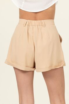 PLEATED CUFF HEM SHORTS100% POLYESTER100% POLYESTER IMPORTED. DESIGNED IN THE USAMODEL IS 5' 9" TALL, 34C" CHEST, 24" WAIST AND 35" HIPS AND WEARING A SIZE SMALLMade In: Imported Solid Color Relaxed Fit Shorts For Spring, Spring Bermuda Shorts With Built-in Shorts, Spring Bermuda Shorts With Built-in Liner, Spring Bermuda Shorts With Rolled Hem, Solid Bermuda Shorts With Short Inseam For Spring, Casual Fitted Shorts With Rolled Hem, Spring Bottoms With Built-in Shorts In Solid Color, Solid Bottoms With Built-in Shorts For Spring, Spring High Waist Shorts With Rolled Hem