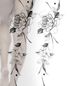 a woman's legs with black and white flowers on the side of her leg