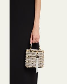 Judith Leiber Couture "Willow" basket top handle bag in woven crystals and zinc alloy     Top handle     Detachable chain shoulder strap, 40"L    Can be worn as a top handle or shoulder bag     Structured top with liftclasp closure; tassel accent     Interior, one card slot     Approx. 8.4"H x 7.4"H x 3.8"D    Item Weight (Lbs.): 2.0    Made in Italy Luxury Evening Bag With Chain Strap In Bucket Shape, Luxury Bucket Evening Bag With Chain Strap, Gold-tone Bucket Evening Bag, Gold-tone Hardware Evening Bucket Bag, Luxury Evening Bag With Handles For Events, Luxury Bucket Evening Bag For Events, Luxury Evening Bags With Bamboo Handle, Luxury Evening Bag With Bamboo Handle, Elegant Gold Bags With Bamboo Handle