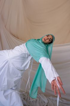 Experience the refreshing allure of Fairuz Blue, inspired by the clear skies of a tropical paradise. This lighter blue hijab, made from our cooling woven fabric, feels like a gentle summer breeze against your skin. Its soft, airy texture and tranquil hue make it a versatile and soothing addition to your summer collection. Shop the Fairuz Blue hijab online today and elevate your wardrobe with this serene piece. Hijab Shop, Blue Hijab, Instant Hijab, Clear Sky, Summer Breeze, Tropical Paradise, Silk Chiffon, Summer Collection, Scrunchies