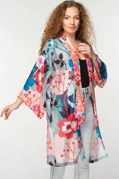 This elegant Malini kimono, by our friends at Sevya Handmade, is crafted with 100% Cupro material for a luxurious yet sustainable option. Its lightweight, breathable composition gives it a similar silk-like feel while significantly reducing care needs. Free-size designed with a floral pattern, this fair-trade garment will provide you with long-lasting comfort. Sevya, derived from Sanskrit, translates to "caring through service". Dedication to preserving India's unique arts and cultures is shown Multicolor Spring Kimono For Brunch, Spring Multicolor Kimono For Brunch, Spring Wrap Kimono With Relaxed Fit, Spring Loungewear Kimono, Multicolor Wrap Kimono For Spring, Spring Silk Kimono With Kimono Sleeves, Multicolor Open Front Robe For Spring, Flowy Kimono For Spring Loungewear, Flowy Kimono For Daywear