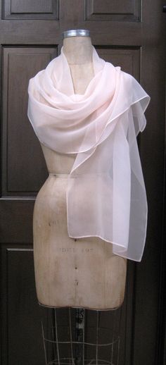 "Chiffon shawl great complimentary for your outfit. Large size of this shall allow to wear it as wrap; light weight of fabric will making elegant draping on your shoulders. High quality polyester fabric preventing from appearing wrinkle when wearing. Wrap, tie to make unique design as desire. Size approximate 17\" x 70\" Color: Blush Fabric: Chiffon /Poly" Elegant Silk Chiffon Scarves For Summer, Elegant Silk Chiffon Scarves For Wedding, Elegant Silk Chiffon Scarf For Wedding, Elegant Silk Chiffon Wedding Scarf, Elegant Chiffon Scarves For Summer, Elegant Sheer Silk Scarves, Elegant Organza Silk Scarf For Summer, Elegant Sheer Chiffon Scarves, Elegant Georgette Shawl