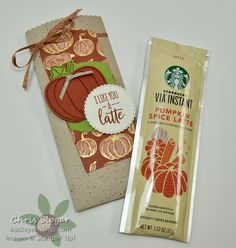 a starbucks bag next to a package of pumpkin spice