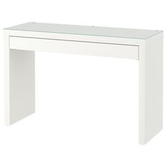 a white desk with a glass top and drawers on the bottom shelf is shown against a white background