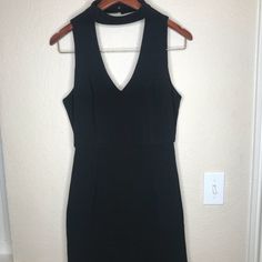 Black Choker Neckline Dress Nice Cloth Material. Took The Tag Off To Wear To A Dinner But It Didn’t Zip So Never Worn Brand New!! Zipper Back And Gold Button Closure Behind Neck Choker Dress, Neck Choker, Neckline Dress, Black Choker, Cloth Material, Necklines For Dresses, Gold Buttons, Forever 21 Dresses, 21 Dresses