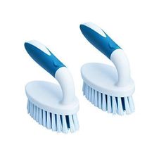 two blue and white toothbrushes sitting on top of each other