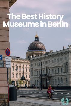 the best history museum in berlin, germany with a woman riding her bike down the street