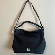 Nwt Calvin Klein Ck Cassidy Crossbody Shoulder Bag Black With Silver Hardware. Beautiful Bag Can Be Worn As Shoulder Bag Or Crossbody. Inside Zipper Pocket And Card Slots New With Tags, Clean, Never Used Approximate Measurements 16” X 11” Calvin Klein Rectangular Bag With Adjustable Strap, Calvin Klein Adjustable Strap Shoulder Bag, Trendy Calvin Klein Rectangular Shoulder Bag, Calvin Klein Leather Shoulder Bag With Adjustable Strap, Calvin Klein Satchel With Adjustable Strap, Modern Calvin Klein Bags With Detachable Strap, Trendy Calvin Klein Rectangular Bag, Calvin Klein Crossbody Bag With Adjustable Strap, Calvin Klein Rectangular Shoulder Bag For Evening