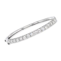 Ross-Simons - 5.00ct t. w. Lab Grown Diamond Bangle Bracelet in 14kt White Gold. 8". Treat yourself to a timeless style at an exceptional value! Our impressive bangle bracelet shimmers with 5.00 ct. t. w. round brilliant-cut lab-grown diamonds in high-polished 14kt white gold. Lab-grown diamonds are identical to mined diamonds according to their optical, physical and chemical properties. All Ross-Simons lab-grown diamond jewelry in 14kt gold and platinum includes an IGI Laboratory-Grown Diamond Classic White Gold Bangle With Diamond Accents, Classic Bangle With Single Cut Diamonds, Classic Diamond Cut White Bangle, Classic Diamond Cut Bangle In Diamond White, Classic Bangle With Brilliant Cut For Formal Occasions, Classic Diamond White Bangle With Diamond Cut, Classic Formal Bangle With Brilliant Cut, Classic Diamond White Bangle For Formal Occasions, Classic Sterling Silver Diamond Cut Bangle