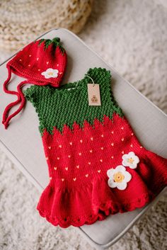 Funny and super cute strawberry dress for your little one! Hand knit dress with matching chullo hat made by WoolenWool! What about wearing adorable matching outfit with your all family including your pets? WoolenWool makes hand knitwear for little princess and her dog - check it out: https://www.etsy.com/listing/757180777/knit-strawberry-yorkshire-terrier?ref=shop_home_active_13&frs=1 100% half wool Sizing: 6-9 months old 9-12 months old If you are not sure about sizing or you would like to Cute Hand Knitted Cotton Dresses, Hand Knitted Cotton Dresses In Cute Style, Hand-knitted Cotton Dresses In Cute Style, Hand Knitted Cute Cotton Dresses, Cute Pink Knitted Dress, Cute Hand Knitted Pink Dress, Cute Hand Knitted Spring Dresses, Cute Handmade Spring Dress, Hand Knitted Cute Spring Dresses