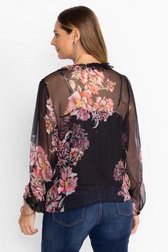 Crafted from 100% sumptuous silk, the Jaycee Peasant Blouse is adorned with delicate pink floral blooms. Featuring intricate ruffles at the neck and gathered sleeves, this slip-lined blouse is finished with fabric covered buttons and loops. Pair with a classic pencil skirt and black pumps for a polished workday ensemble. Johnny Was Women's Jaycee Peasant Blouse in Juliette Black, Size PL, Silk, Floral Silk Floral Print Blouse For Daywear, Feminine Floral Print Blouse For Daywear, Flowy Silk Blouse For Spring, Spring Silk Tops With Floral Print, Spring Silk Blouse With Floral Embroidery, Silk Pink Floral Print Blouse, Pink Silk Blouse With Floral Print, Elegant Pink Blouse With Floral Print, Pink Silk Blouse For Spring