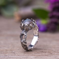 "Tree branch sculpted ring in sterling silver with labradorite gemstone. Witchy magical silver ring. This ring was sculpted in wax in the lost wax technique. Details & Measurement: * The ring width on the front side - 0.3\" (10 mm) * The ring width on the back side - 0.15\" (4 mm) * Gemstones in 8 mm to to set in the ring: Labradorite , rainbow moonstone, Smoky quarts in rose cut, Rutilated quartz with gold threads, Blue chalcedony in rose cut, Garnet * The ring arrives in a jewelry gift box Silver Labradorite Nature-inspired Jewelry, Nature-inspired Silver Labradorite Jewelry, Silver Labradorite Hand Forged Rings, Hand Forged Silver Labradorite Rings, Nature-inspired Moonstone Ring, Nature-inspired Silver Rings With Natural Inclusions, Fantasy Rings, Magical Ring, Witch Ring