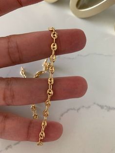 14K Gold Puffed Mariner Anklet Bracelet, 4MM Wide, Real 14K Gold Anklet, Gold Ankle Bracelet, Women Ankle Jewelry, Puffed Mariner Anklet, 4MM Mariner Style Gold Anklet, Shiny Finish, Mariner Anklet, Thick Gold Anklet, Light weight  ♦ Materials: 14K Solid Gold ♦ Available colors: Gold  ♦ Anklet measurements: 10" in length, 4mm in width ♦ Approx. Weight: 3.8 grams PRODUCTION TIMES Order processing time varies between 1-2 business days, we work on our pieces daily All orders placed on Sunday, or on Anklet Gold, Ankle Jewelry, Gold Anklet, Bracelet Women, Ankle Bracelet, Ankle Bones, Anklet Bracelet, Anklet Jewelry, Body Jewellery