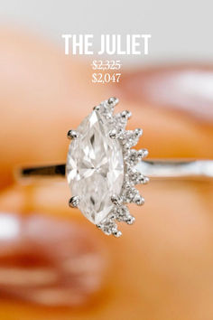 a close up of a diamond ring on someone's finger with the title, the jubilee