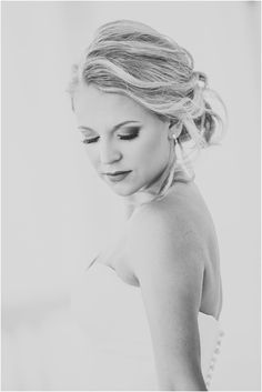 black and white photograph of a woman in a wedding dress