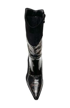 A patchwork of mixed textures and shining studs add a contemporary western-appeal to a pointed toe boot. 3.25" heel 8" shaft height, 11" opening circumference Side zip closure Cushioned footbed Manmade upper and lining, rubber sole Imported Black Western Boots With Rhinestone Rivets, Western Style Leather Knee-high Boots For Party, Fitted Pointed Toe Boots With Rivets, Fitted Leather Boots With Rhinestone Rivets, Western Pointed Toe Boots With Rhinestone Rivets, Leather Boots With Rhinestone Rivets And Pointed Toe, Fitted Black Boots With Silver Studs, Embossed Boots, Emboss