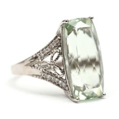 I love chunky rings and I love the ethereal color of green amethyst (Prasiolite). This ring features a 19.75x9.85mm prasiolite set in 9k white gold. In excellent condition. Ring size 8.25. Sizing available Layaway available via TotemKitten.com Watch Cufflinks, Green Amethyst Ring, Bow Ring, Chunky Rings, Green Amethyst, Amethyst Ring, Rings Statement, Ring Shopping, Ring Earrings