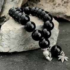 This handmade tasbih; It is also known by different names such as misbaha, prayer beads, rosary, chapelet, dhikr beads, misbah, sibha, stress beads. This islamic tasbeeh is a great idea on muslim gift. All beads are glass. The elastic thread of the rosary allows it to be used as a bracelet as well. Tassel material is stainless metal.  PRODUCT DETAILS Grain Shape: Round Grain Length: 14mm (0.55") Grain Width: 14mm (0.55") Total Length: 20cm (7.8") All our products are handcrafted and carefully ma Bracelet Rosary, Worry Beads, Beaded Rosary, Beautiful Storage, Elastic Thread, Wooden Gift Boxes, Wooden Gifts, Prayer Beads, Character Portraits