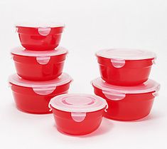 red plastic containers with lids stacked on top of each other in front of a white background