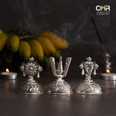 Antique silver treasures that carry the essence of Lord Vishnu. These Shankhu, Chakra, and Naamam figurines adorn your surroundings with spirituality and grace. . . . #silverlordvishnu #silverjewellery #silverlordvishnuidol #cmrjewellery #latestjewellery #silverjewels #silver #giftjewellery #onlinejewellery #gold #finejewellery #jewellerydesign #jewels #indianjewellery #jewellerylover #southindianjewellery #finejewellery #cmrjewellery #cmrwomen Silver Puja Items, Black Dessert, God Venkateswara Images Hd Wallpaper, Silver Articles, Mix Jewelry, Pooja Items, Silver Pooja Items