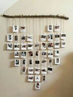 a bedroom with pictures hanging on the wall